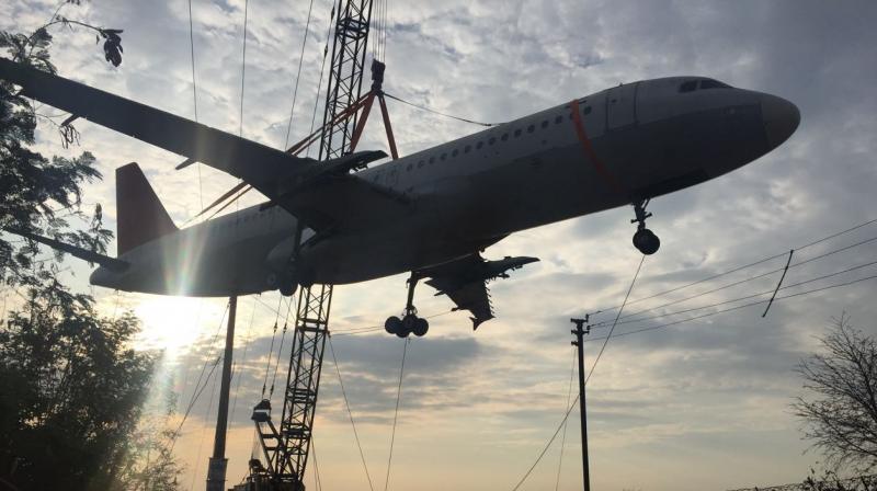 Watch: Crane Carrying Defunct Air India Aircraft Crashes, no casualties Crane carrying defunct AI aircraft crashes